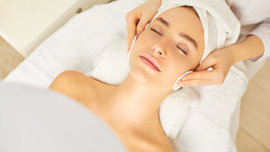 Woman enjoying a relaxing facial treatment